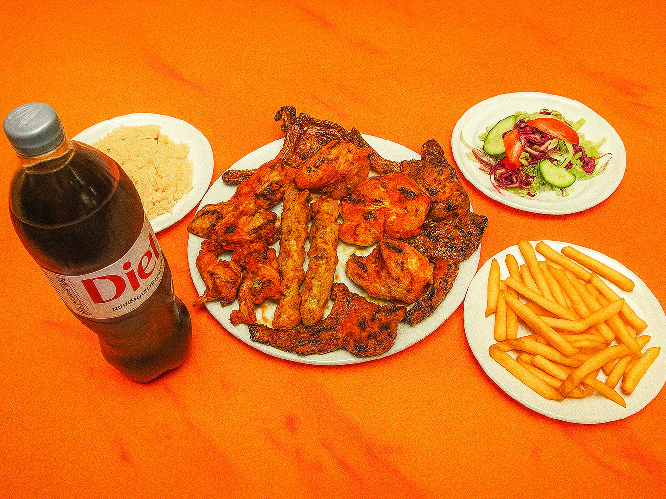 A flavorful assortment of grilled meats and sides — the perfect mix of taste, texture, and aroma on one plate.