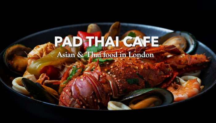 Close-up of a signature seafood Pad Thai dish with a whole lobster, mussels, and king prawns, titled Pad Thai Cafe - Asian & Thai food in London