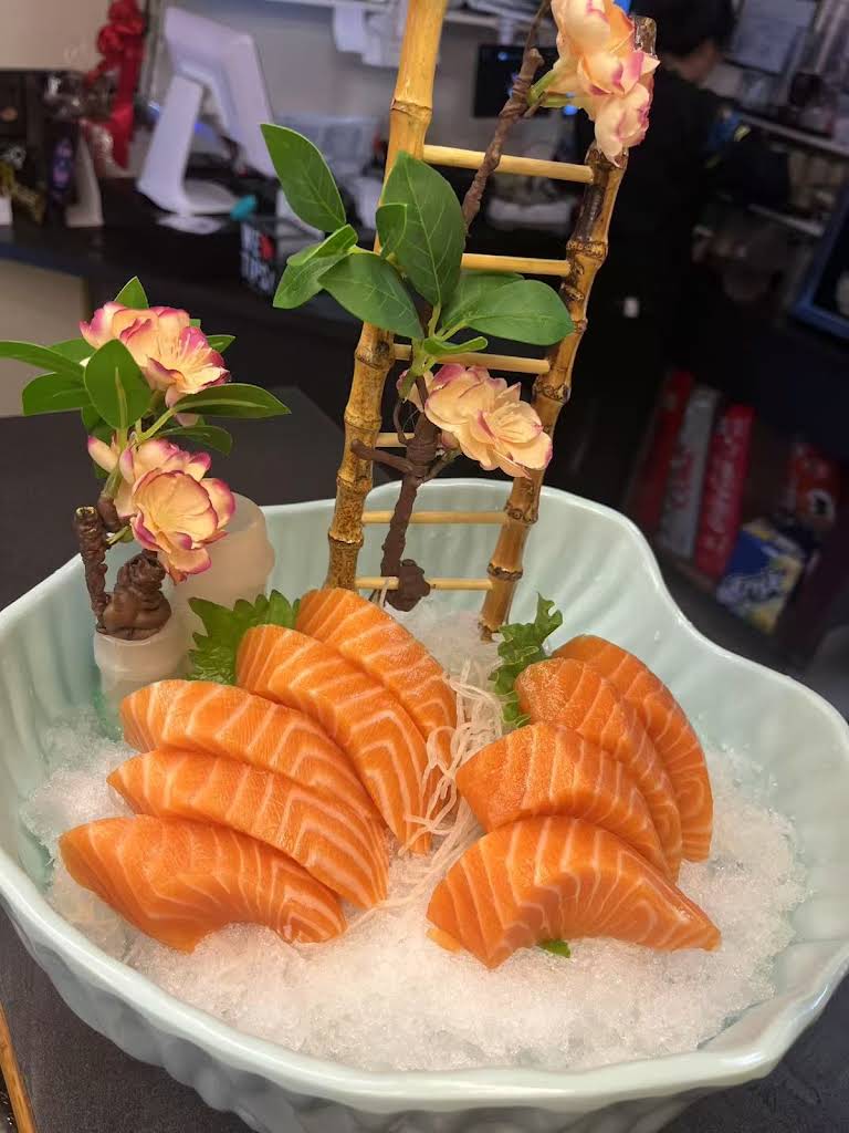Fresh salmon sashimi beautifully presented at Guildford Sushi House