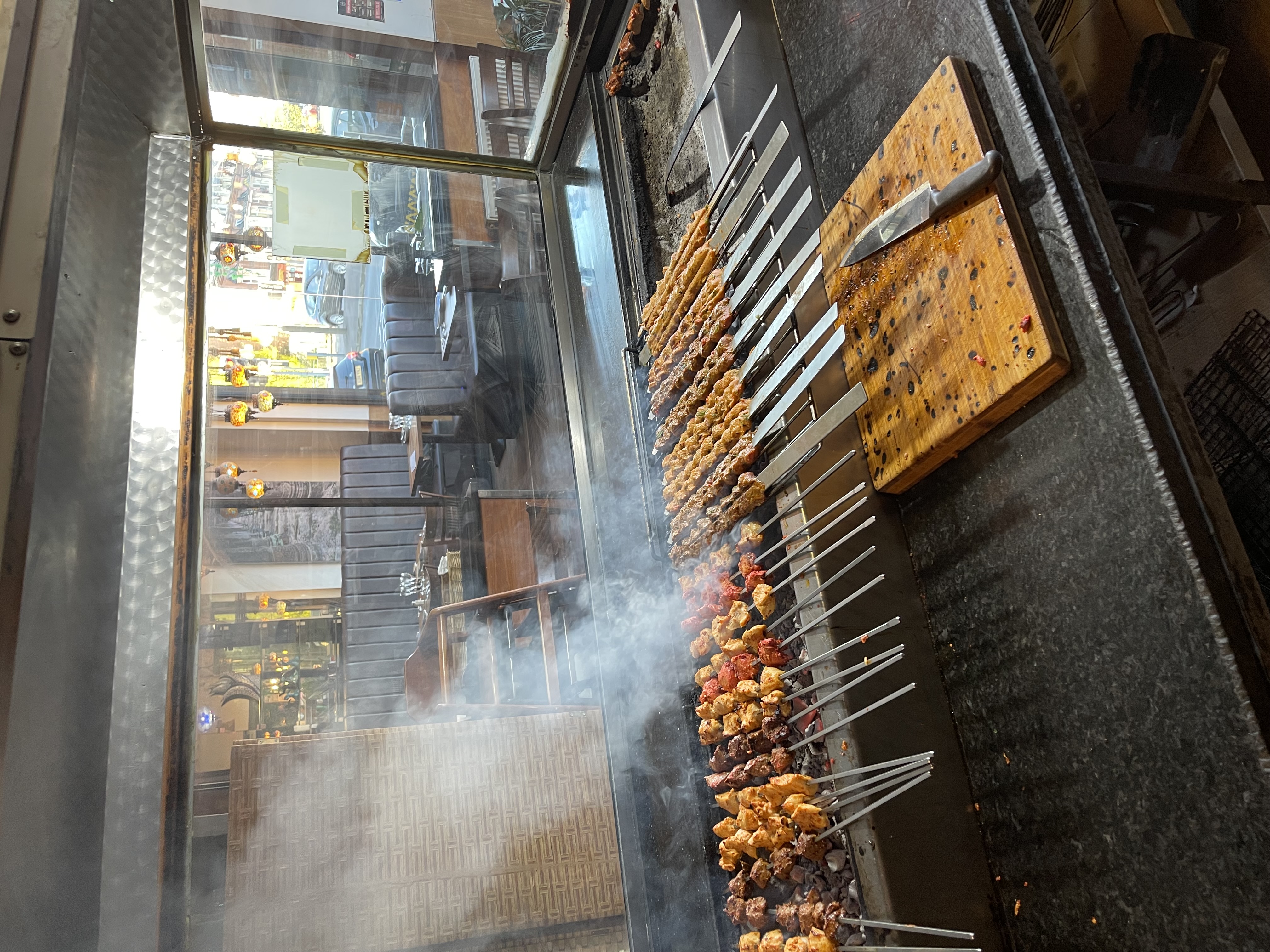 Fresh halal meats sizzling on the grill at Antalya Turkish Restaurant Leicester.