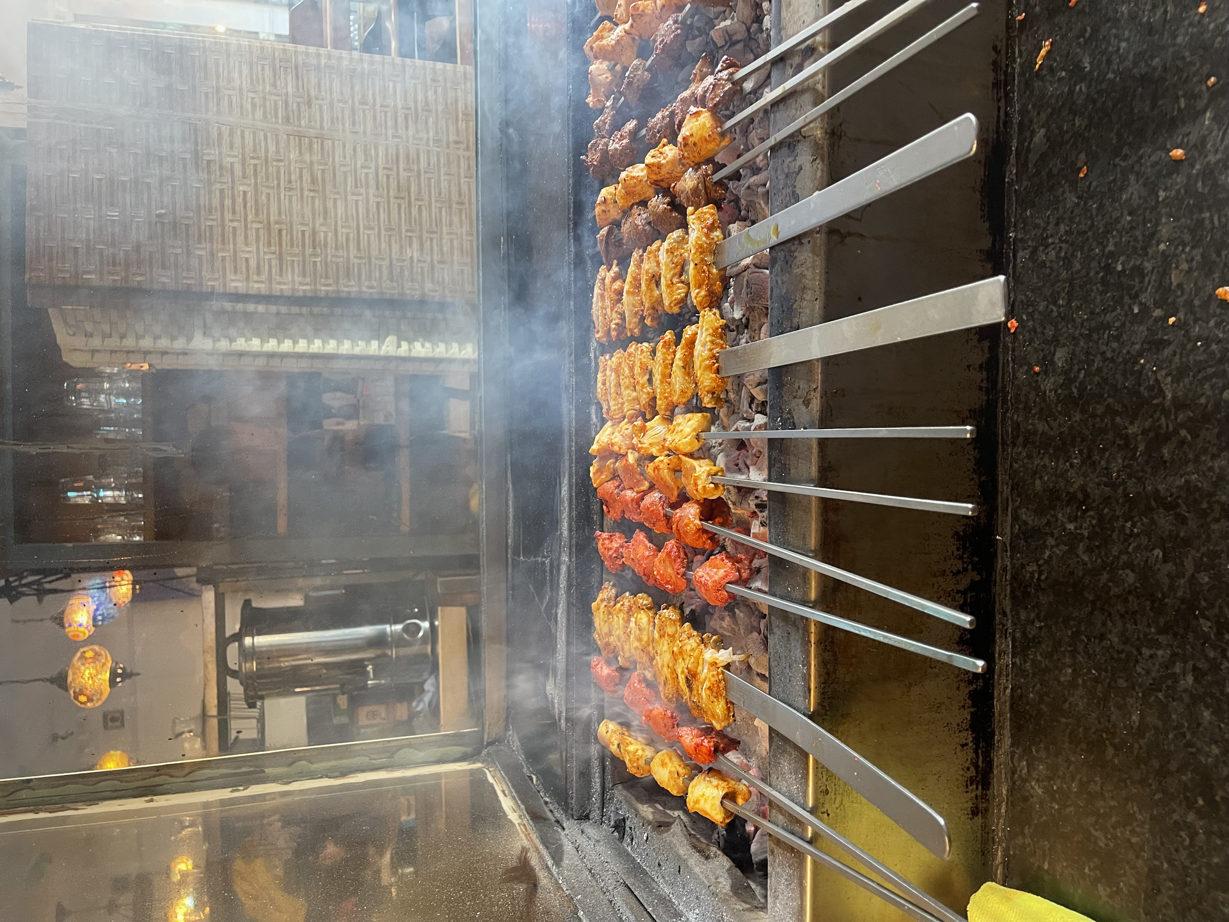 Authentic Turkish BBQ meats sizzling over open flames at Antalya Leicester.