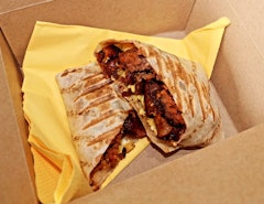 Forest Hill Breakfast Burrito - Scrambled egg, bacon, sausage, black and white pudding and relish toasted in a wrap.