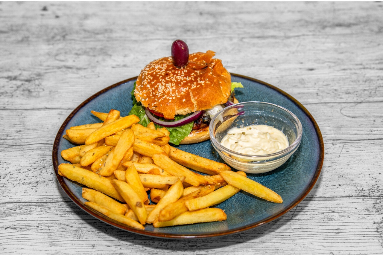 Beef burger, burger sauce, chips, fries.