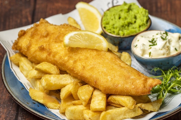 Fish City's Award Winning Fish and Chips, sustainably sourced, tempura battered, fresh home-cut chips, with homemade chunky tartare and mushy peas